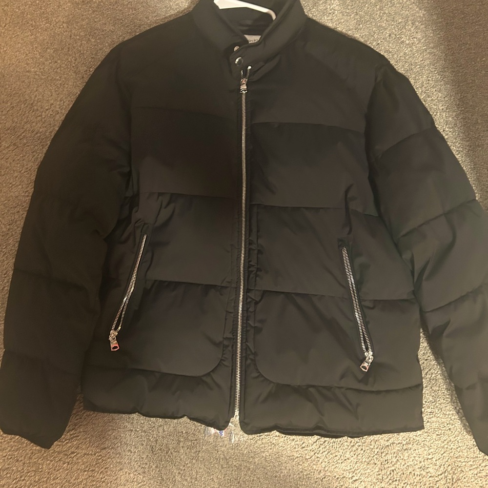 Calvin Klein black puffer jacket large 
Barely worn in perfect condition